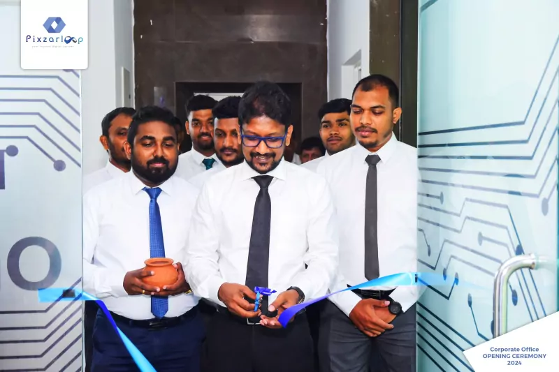 Ribbon cutting at the Pixzarloop corporate office opening