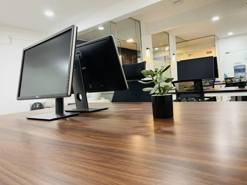 Workstations inside the new Pixzarloop corporate office